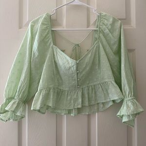 Quarter sleeve ruffle crop top